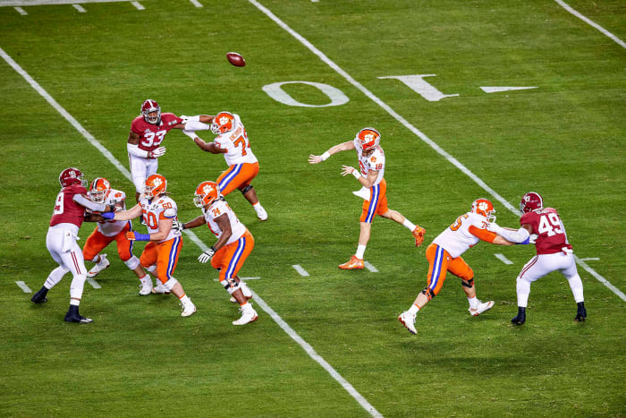 Trevor Lawrence throws a pass against Alabama in the national title game his freshman year at Clemson